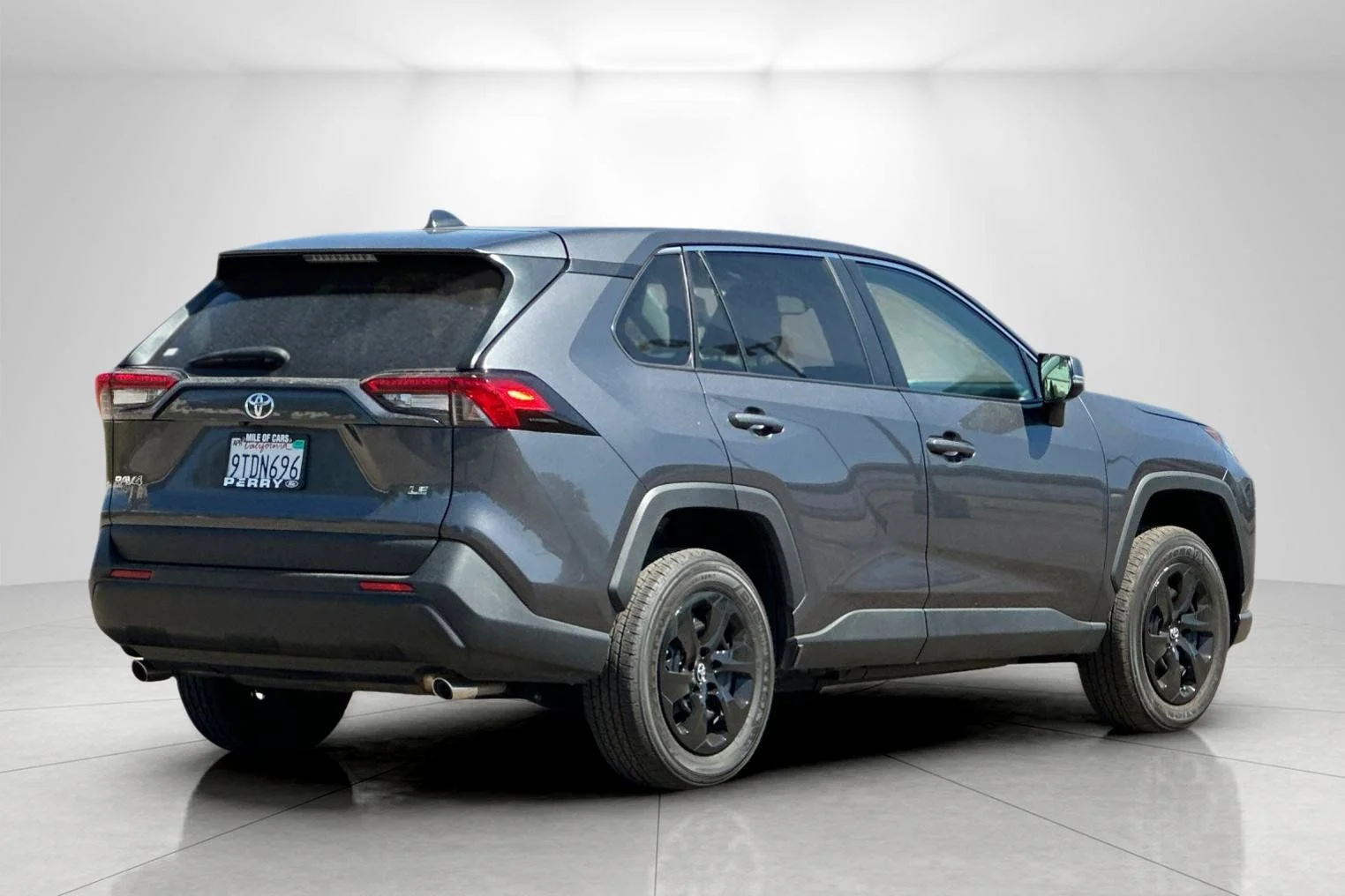 Used 2025 Magnetic Gray Metallic Toyota LE image 3
