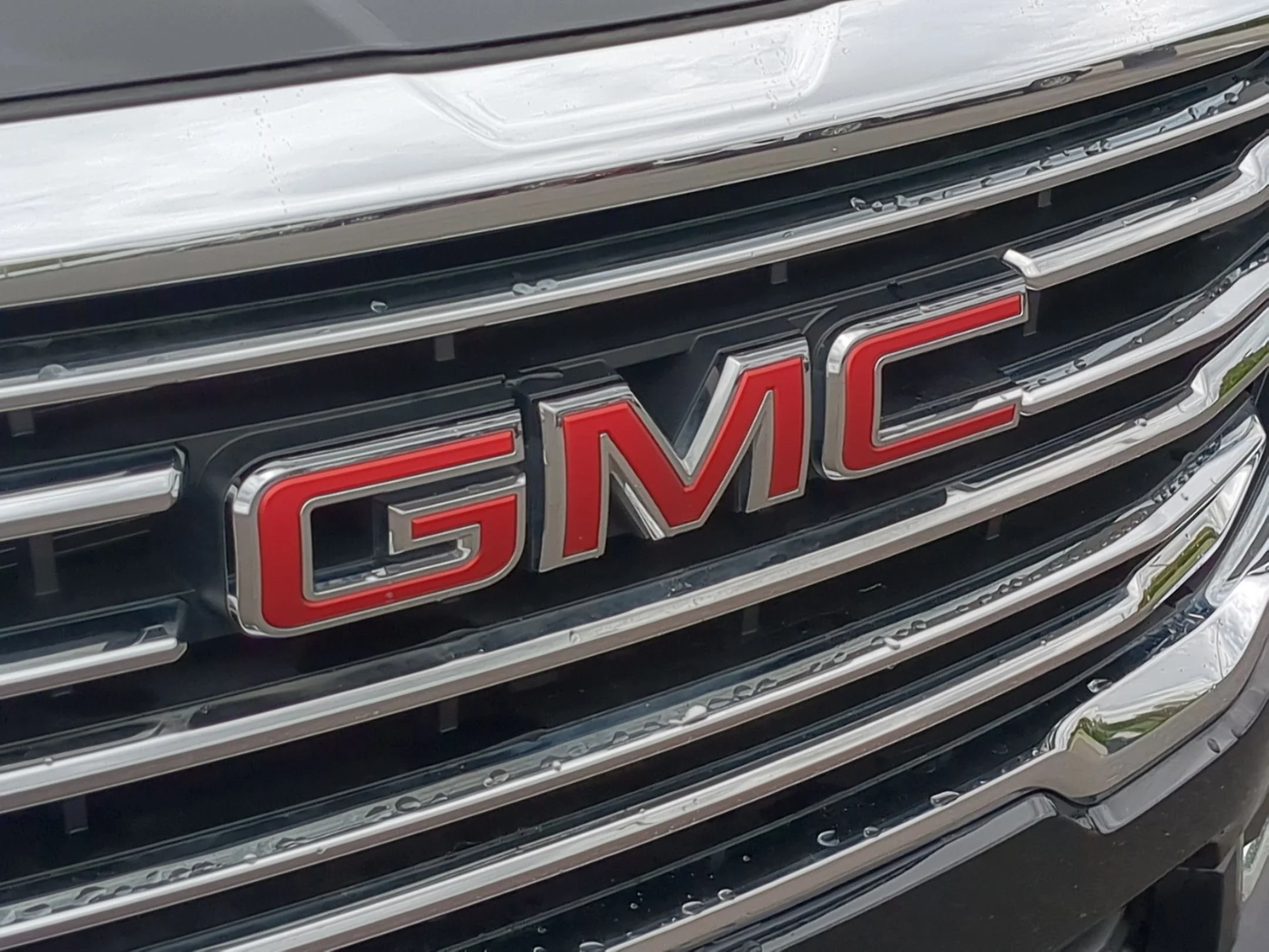 Used 2023 Ebony Twilight Metallic GMC SLT image 30
