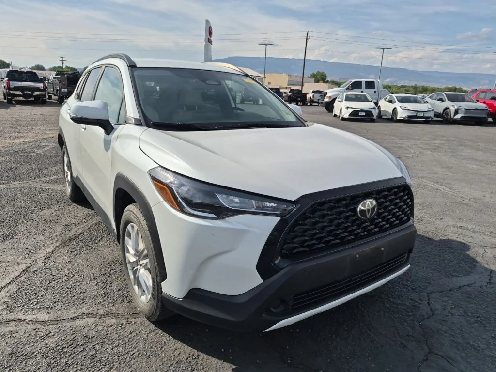 Used 2023 Pearl Toyota LE image 1