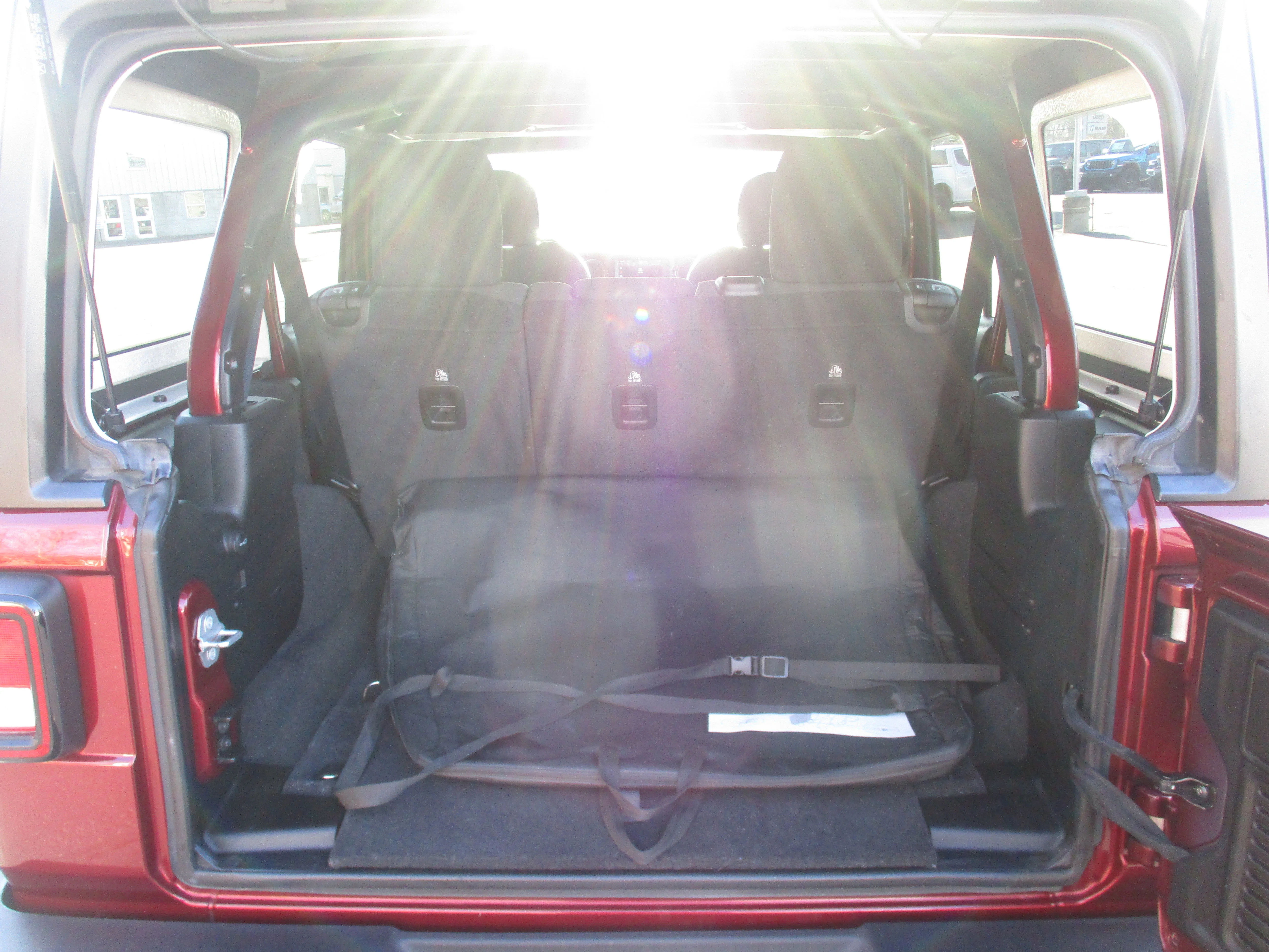 Used 2021 Snazzberry Pearlcoat Jeep Unlimited Sport Altitude image 14
