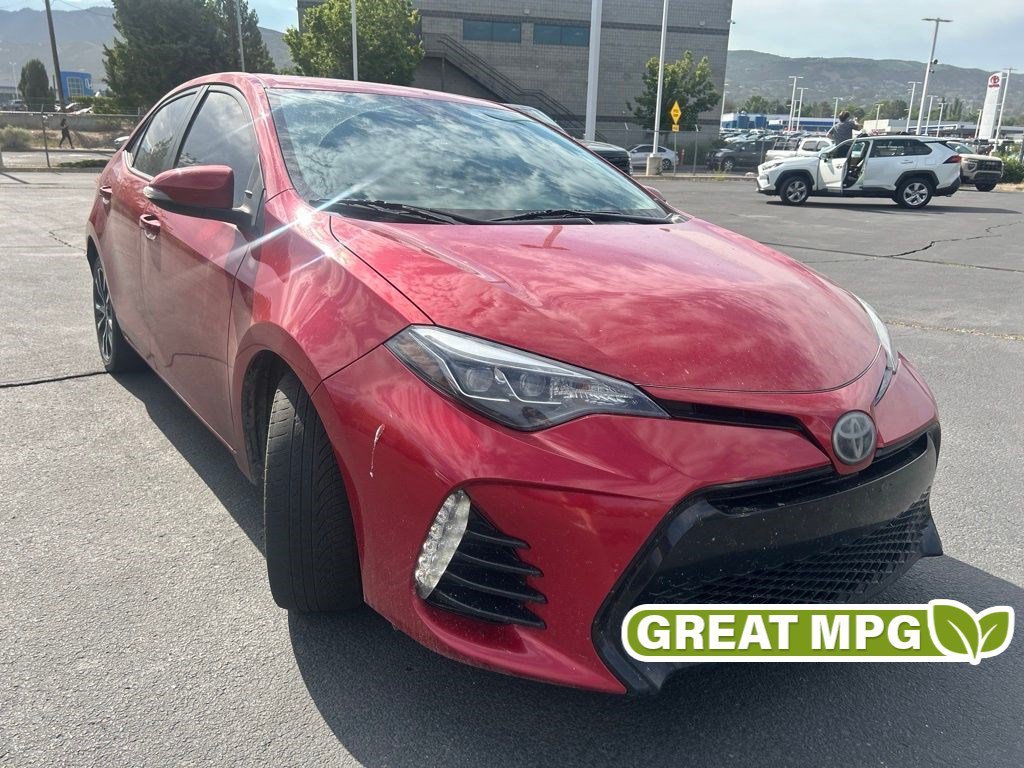 Used 2017 Barcelona Red Metallic Toyota SE image 1