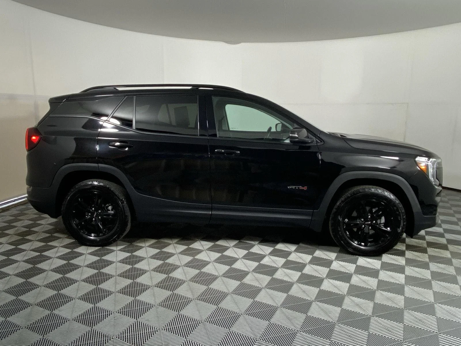 Used 2024 Ebony Twilight Metallic GMC AT4 image 3