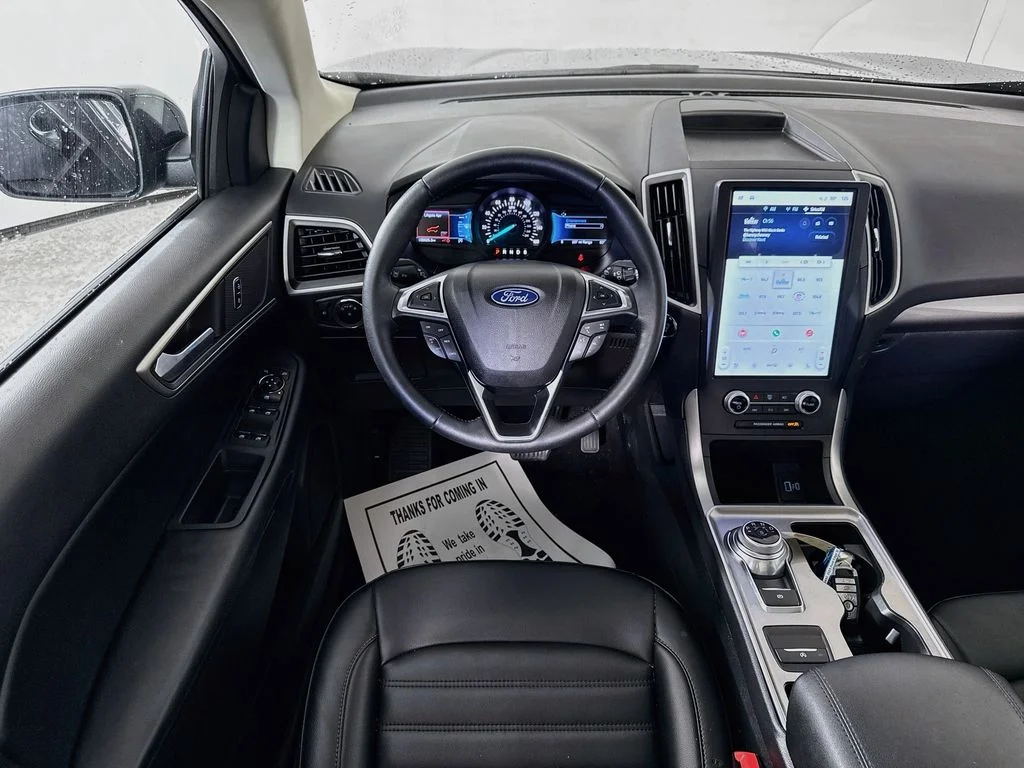 Used 2023 Agate Black Metallic Ford SEL image 4