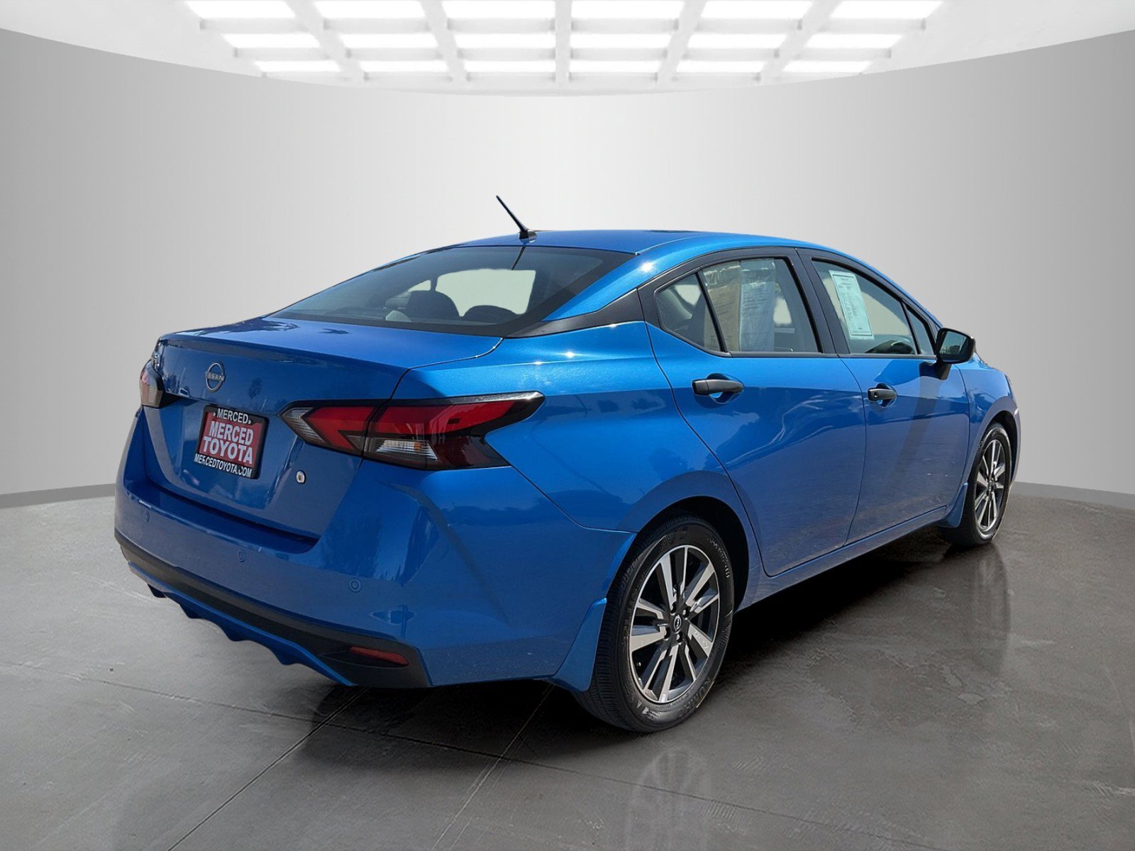 Used 2024 Electric Blue Metallic Nissan S image 3