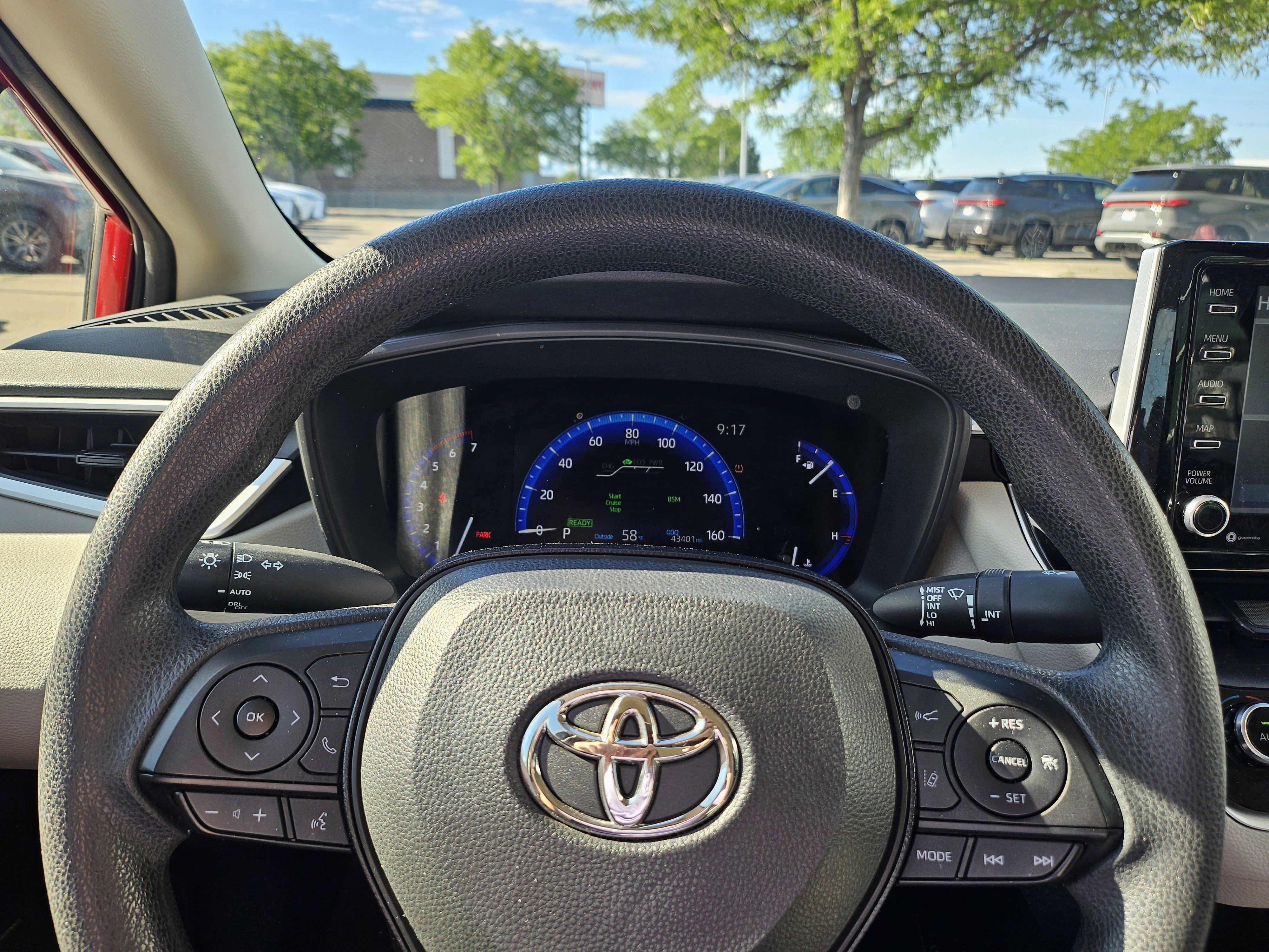 Used 2021 Barcelona Red Metallic Toyota LE image 11