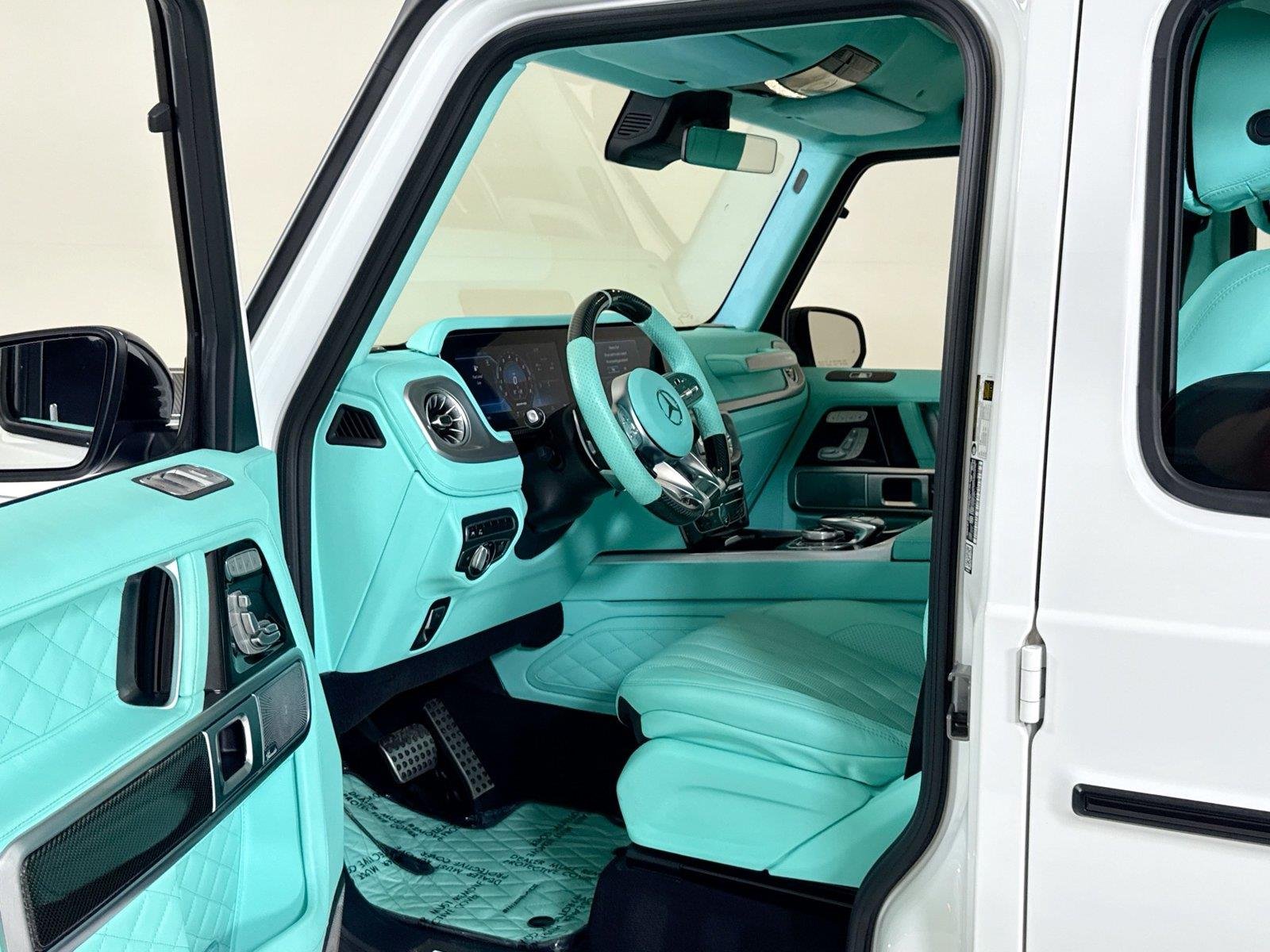 Used 2024 Polar White Mercedes-Benz AMG® G 63  Brabus Custom Widebody / Custom Tiffany Interior image 12