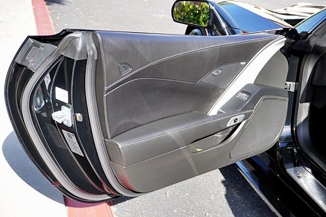 Used 2019 Black Chevrolet Grand Sport image 18