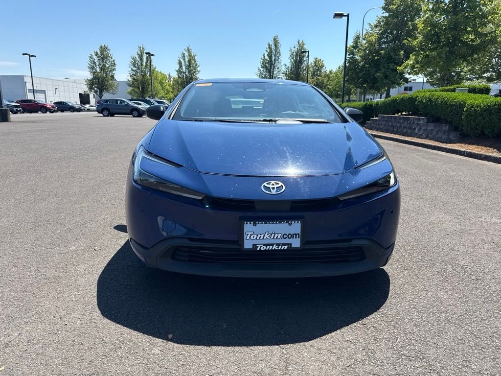 Used 2025 Reservoir Blue Toyota LE image 2
