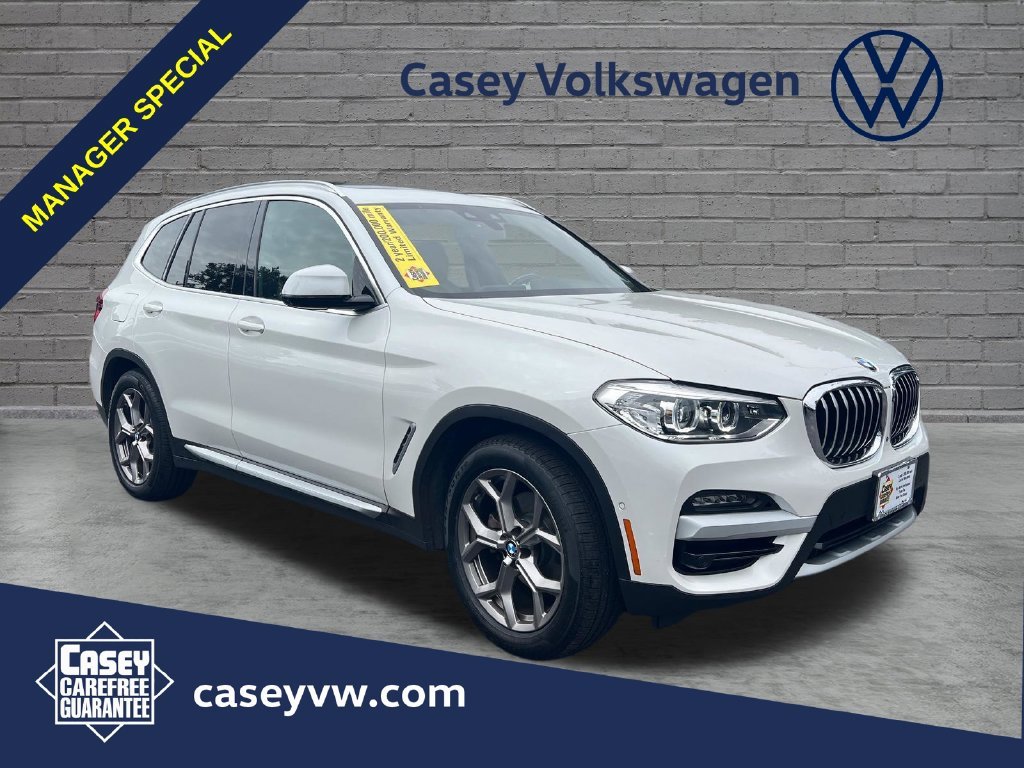 Used 2021 White Metallic BMW xDrive30i image 1