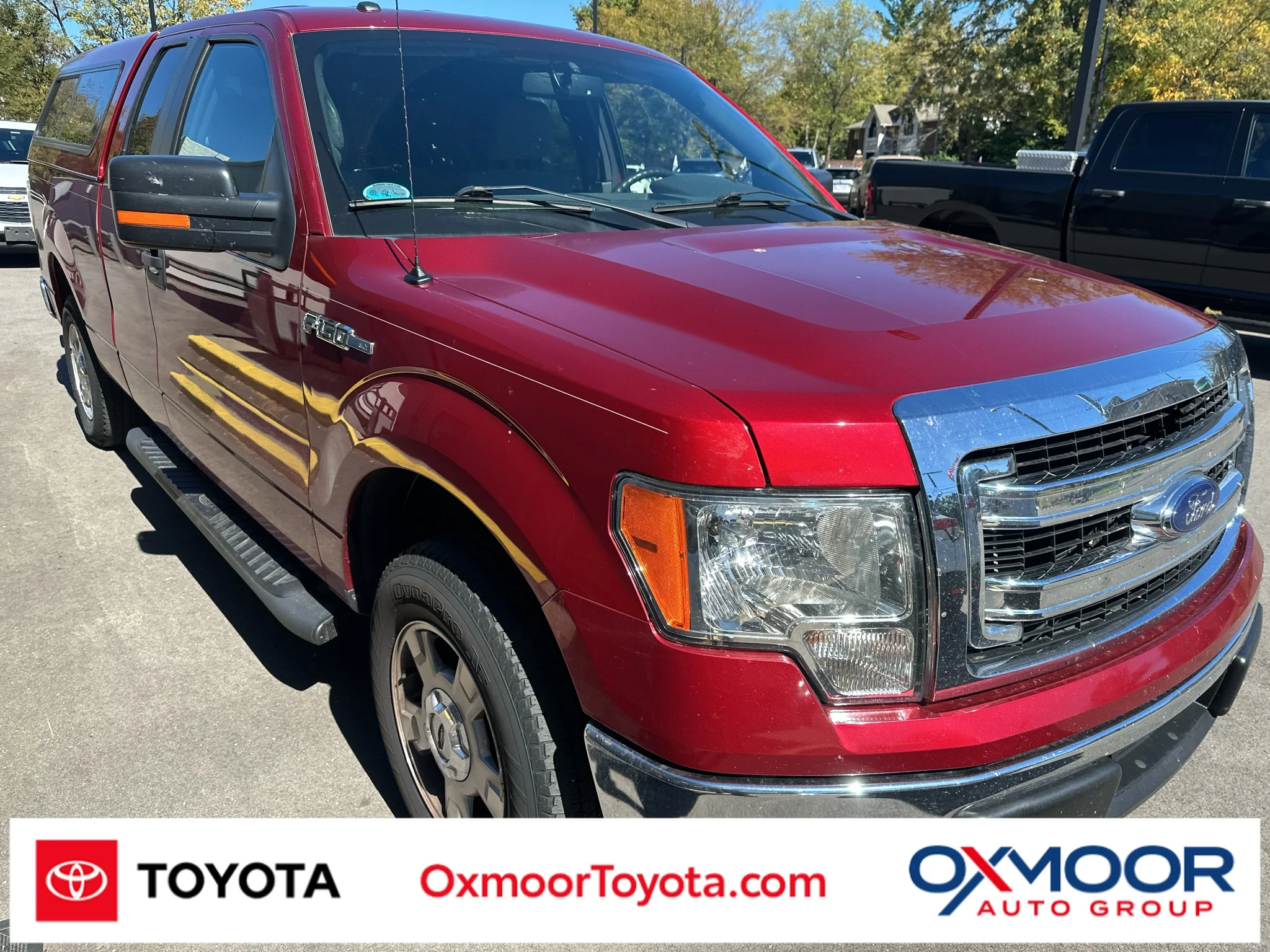 Used 2014 Ruby Red Metallic Tinted Clearcoat Ford XLT image 1