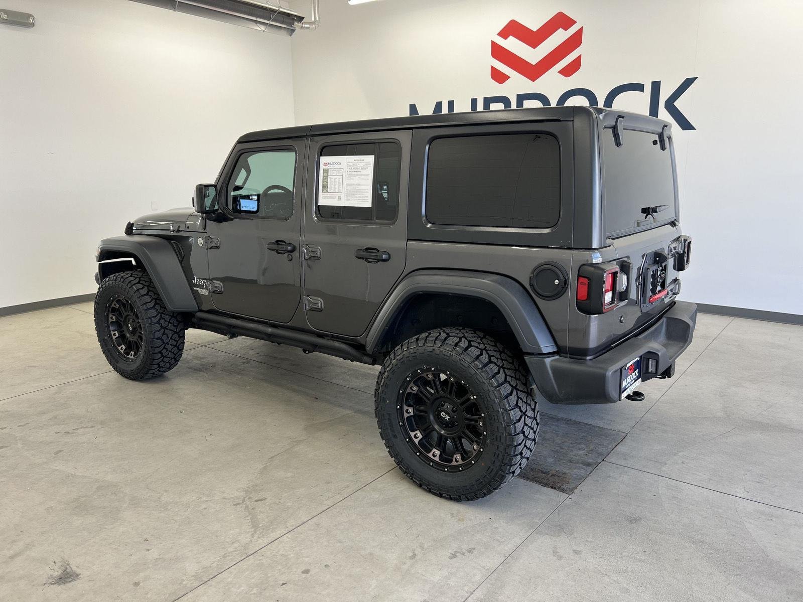 Used 2019 Granite Crystal Metallic Clearcoat Jeep Sport S image 2