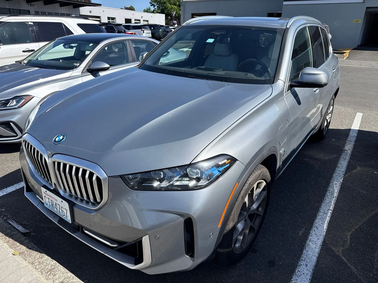 Used 2025 Gray Metallic BMW xDrive50e image 1