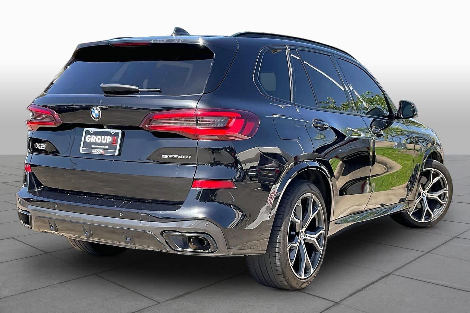 Used 2021 Black Sapphire Metallic BMW sDrive40i image 12