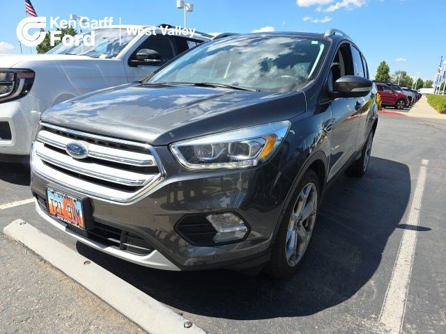Used 2017 Magnetic Metallic Ford Titanium image 1