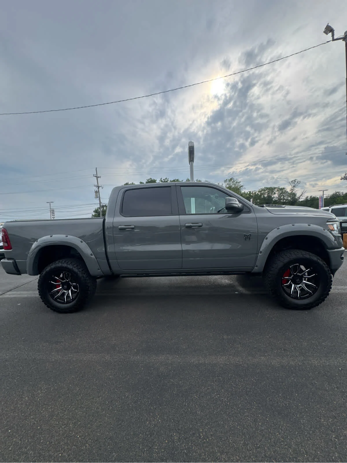 Used 2024 Diamond Black Ram Laramie image 4