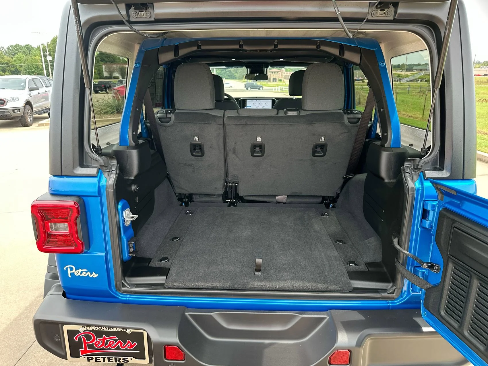 Used 2024 Hydro Blue Pearl Coat Jeep Sport image 22