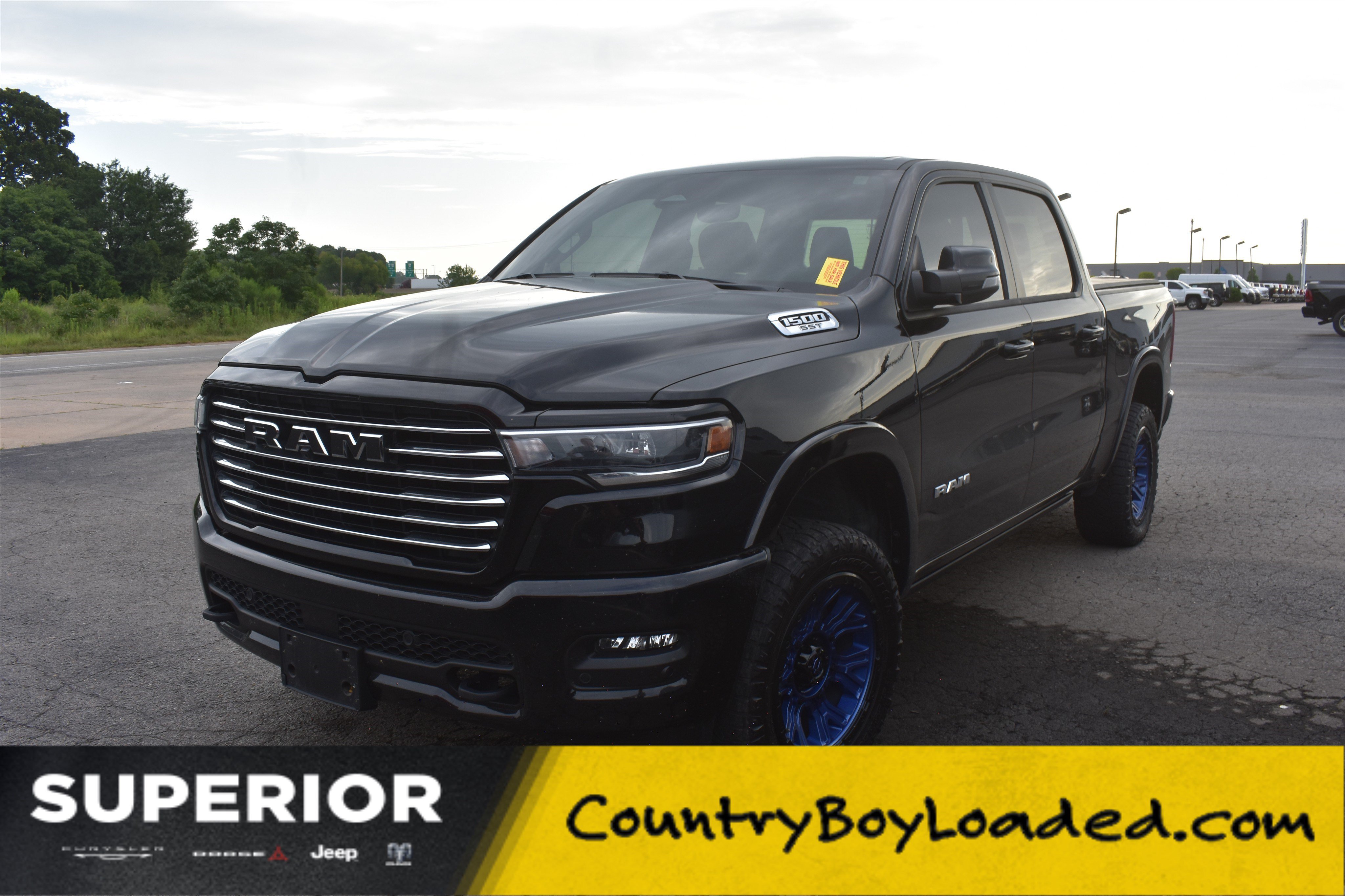 Used 2025 Diamond Black Crystal Pearlcoat Ram Laramie image 1
