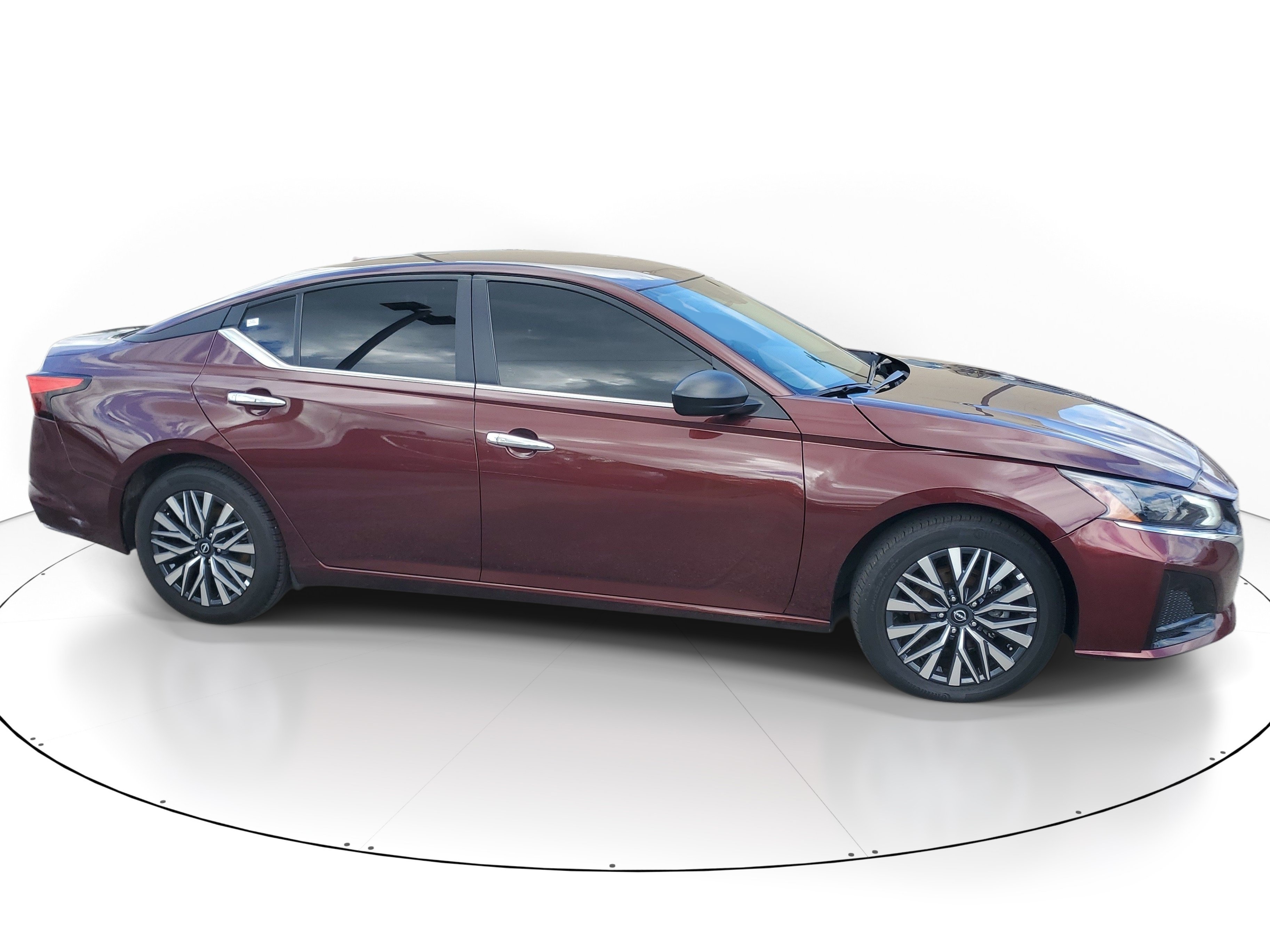 Used 2025 Garnet Pearl Metallic Nissan SV image 1