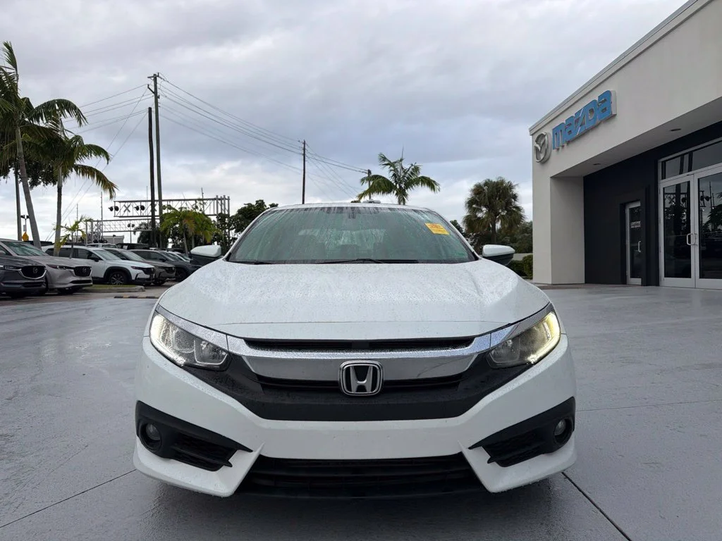 Used 2017 Honda Civic EX-L with VIN 19XFC1F70HE000921 for sale in North Palm Beach, FL