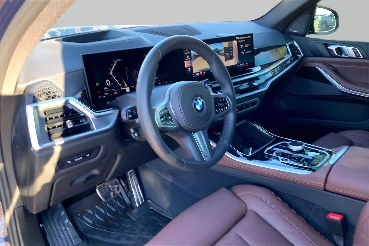 Certified Used 2025 Tanzanite Blue II Metallic BMW xDrive40i image 18