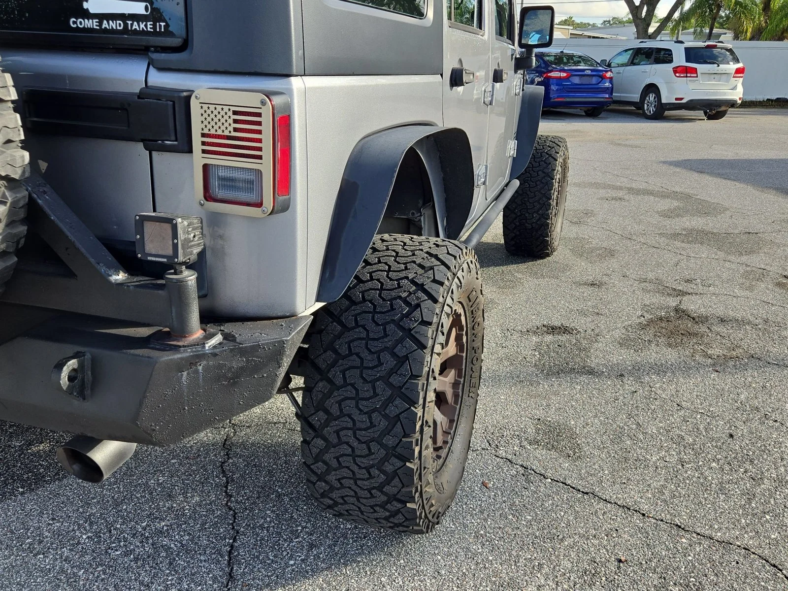 Used 2015 Billet Silver Metallic Clearcoat Jeep Sport image 16