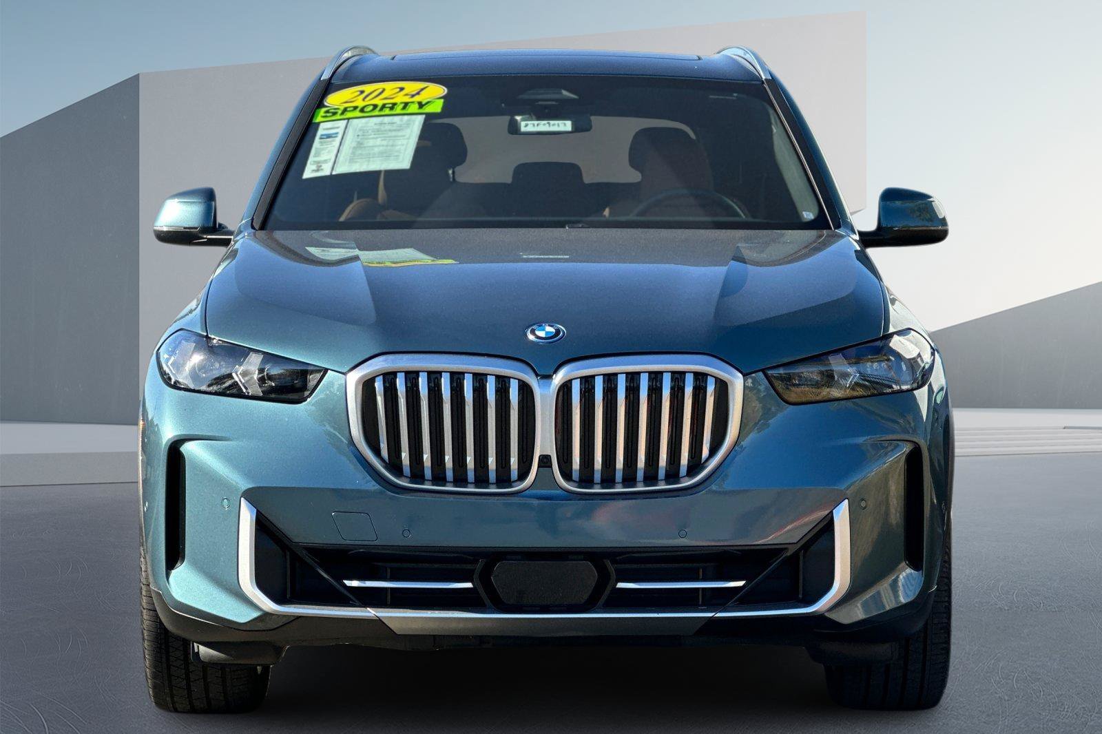 Used 2024 Blue BMW xDrive50e image 4