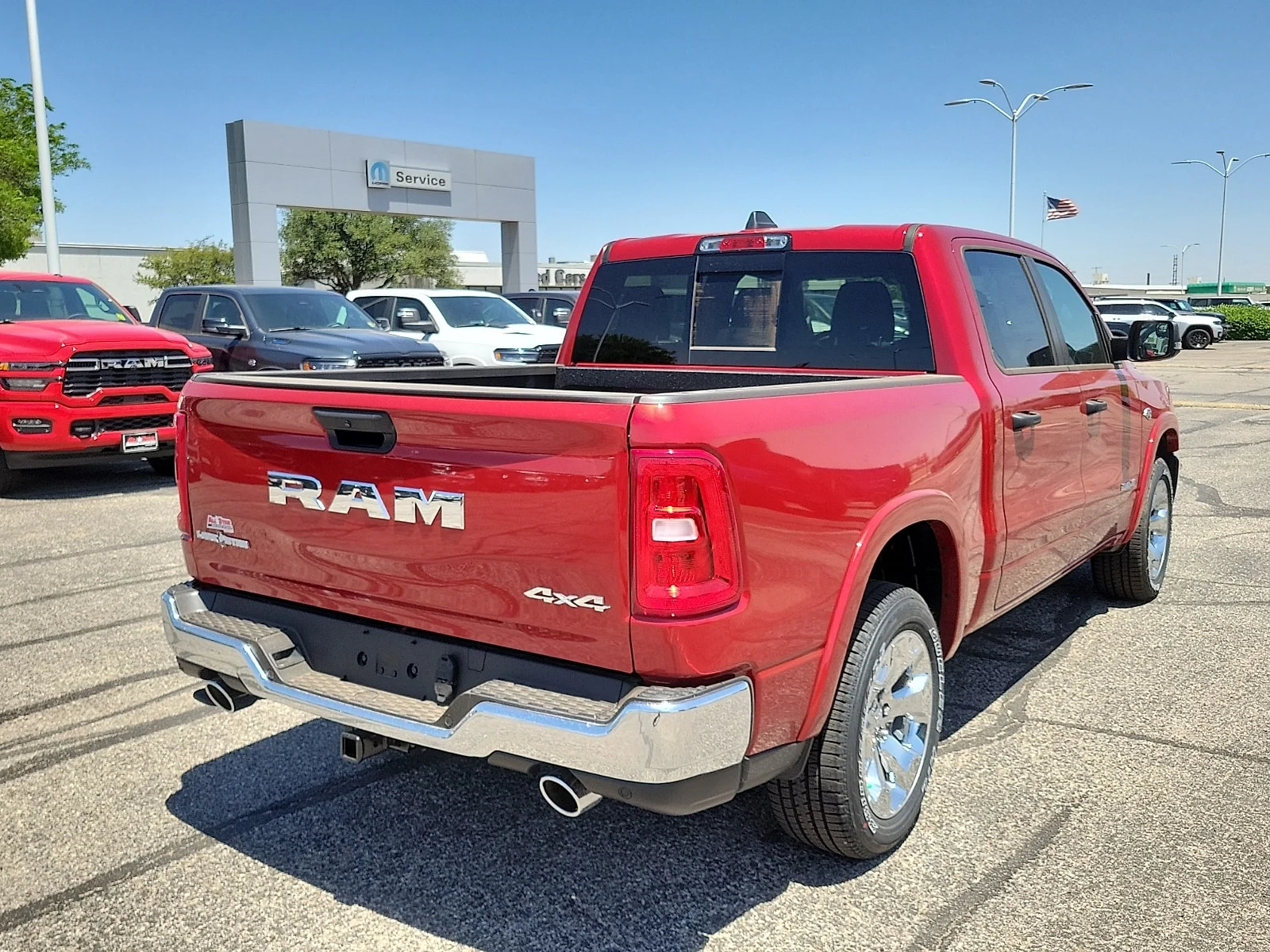 New 2026 Molten Red Pearlcoat Ram LONE STAR CREW CAB 4X4 5