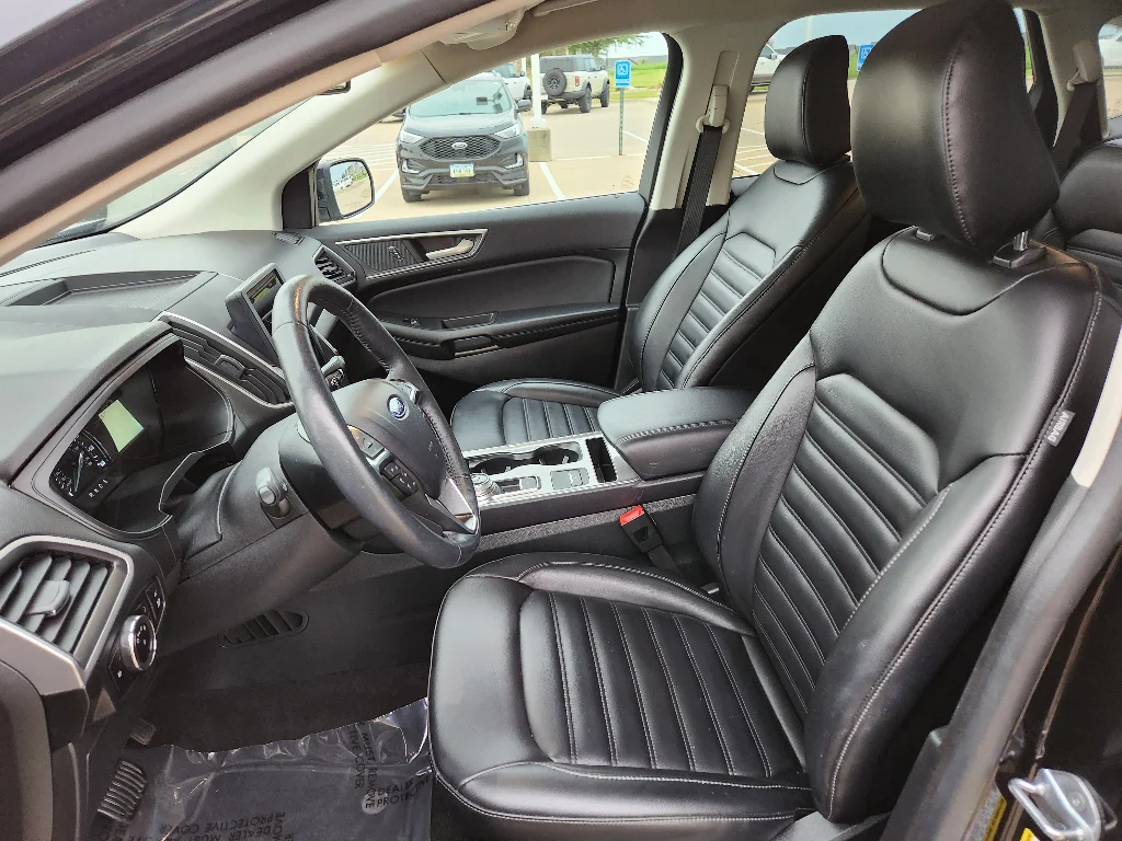 Used 2024 Agate Black Metallic Ford SEL image 12