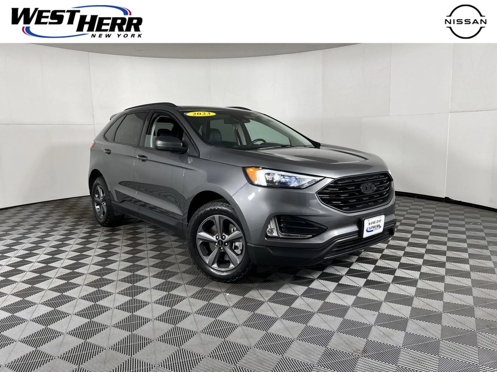 Used 2023 Carbonized Gray Ford SEL image 1