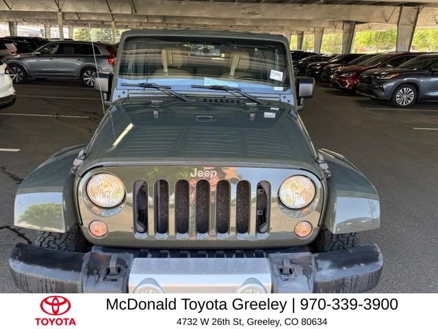 Used 2015 Green Jeep Unlimited Sahara image 2