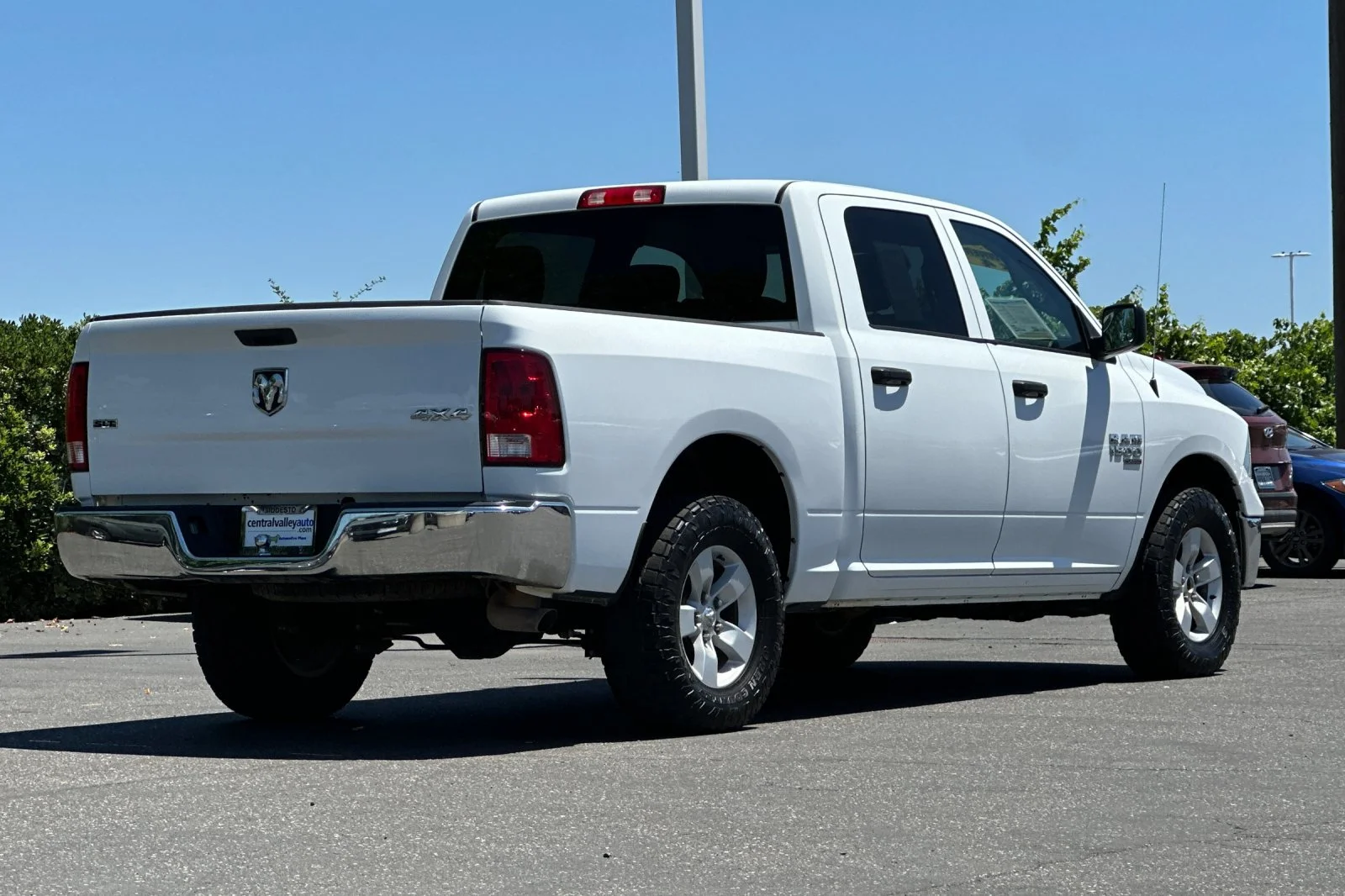 Used 2023 Bright White Clearcoat Ram SLT image 4