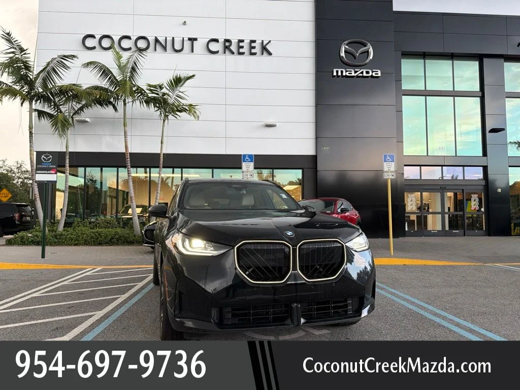 Used 2026 Black Sapphire Metallic BMW 30 xDrive image 1