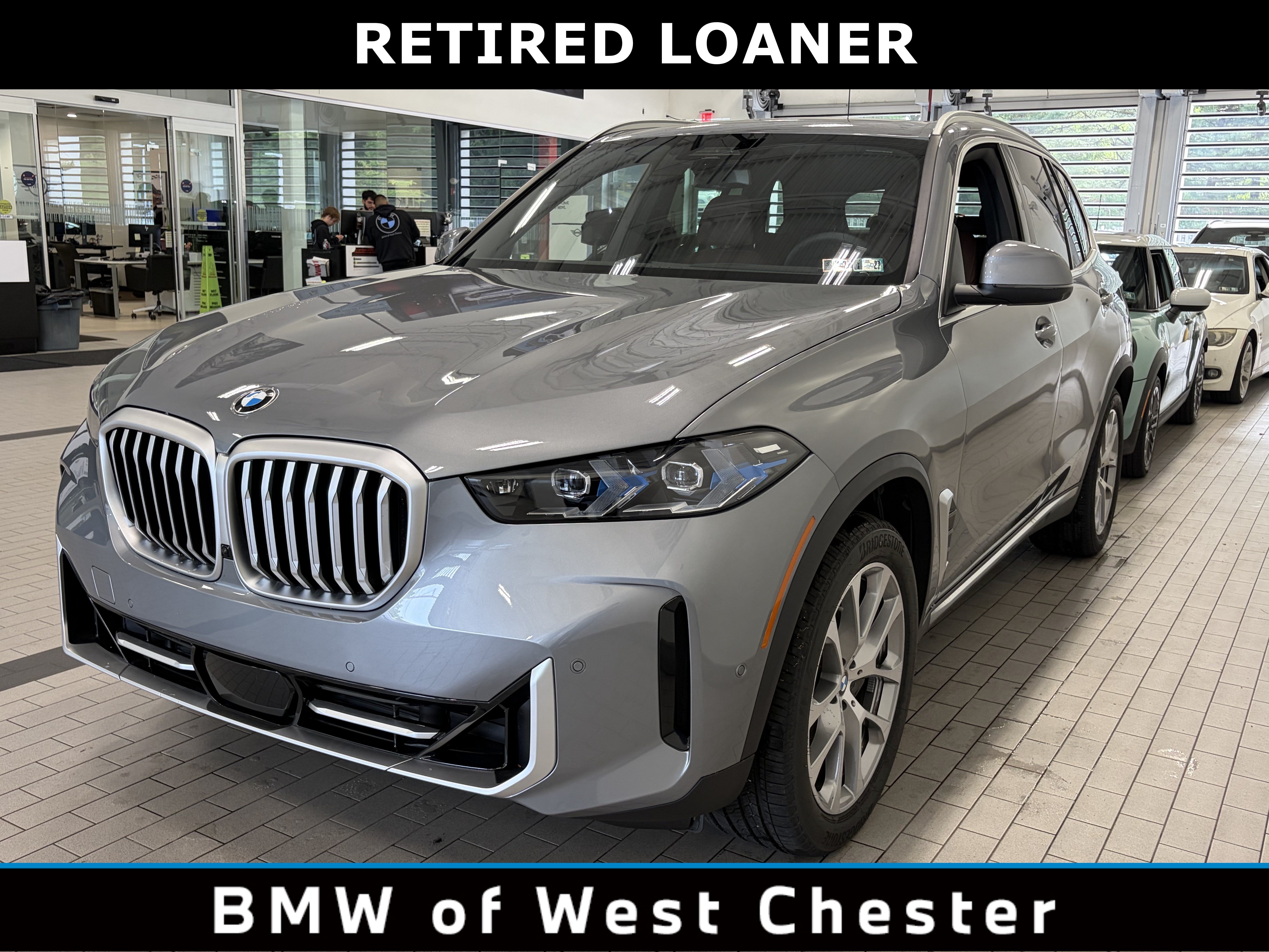 Used 2026 SKYSCRAPER GREY M BMW xDrive40i image 1