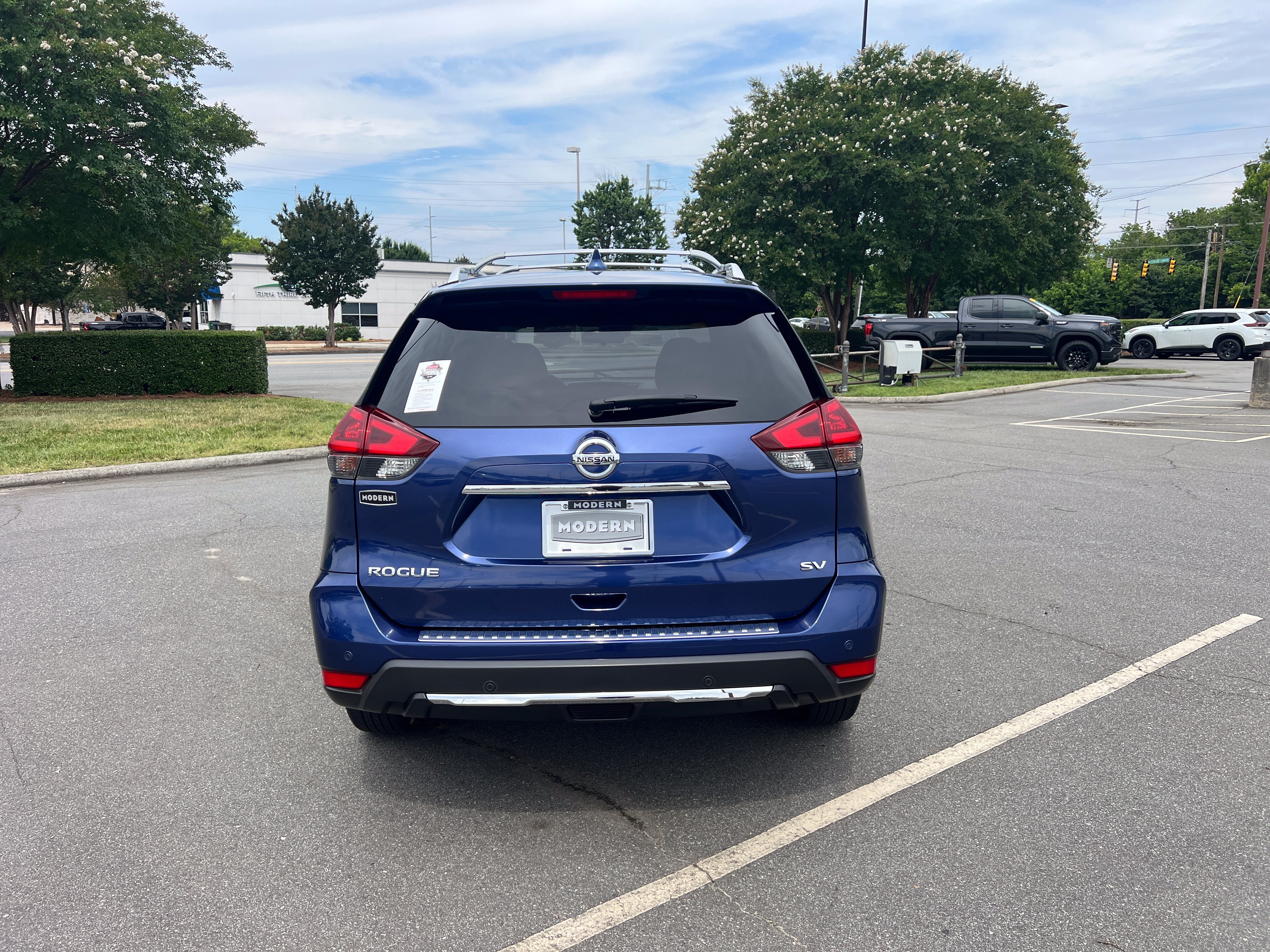 Used 2019 Caspian Blue Metallic Nissan SV image 6