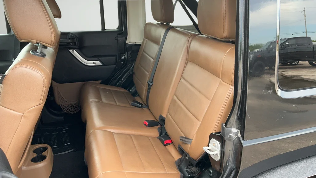 Used 2012 Black Jeep Unlimited Sahara image 19