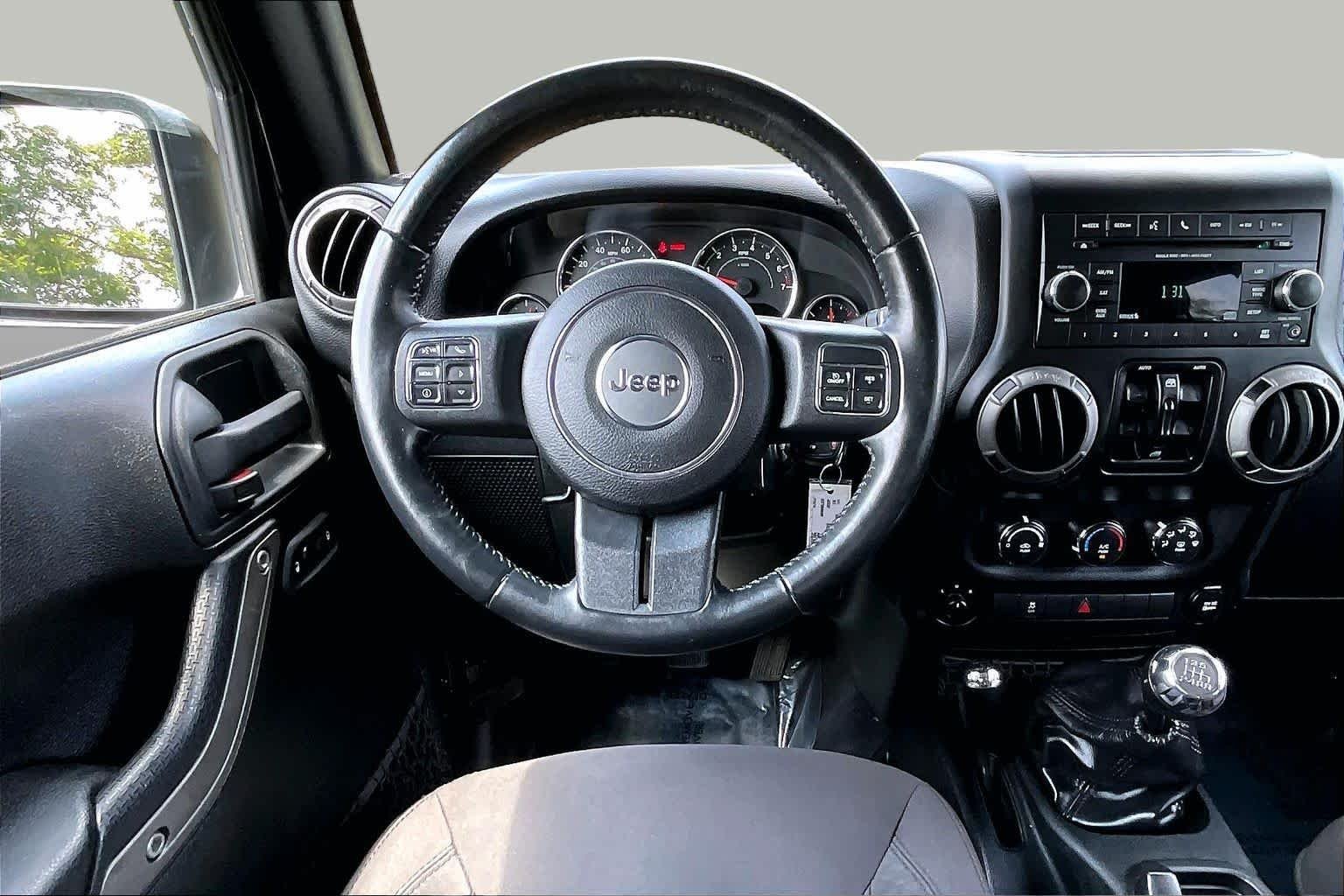 Used 2016 Black Clearcoat Jeep Sport image 6