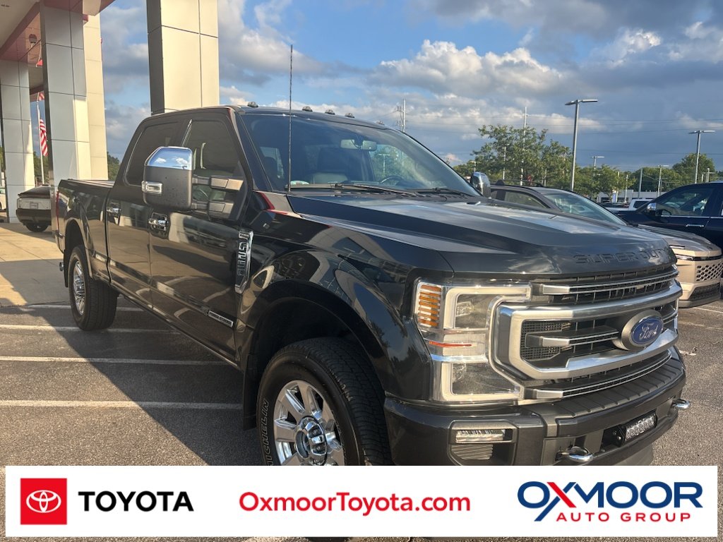 Used 2022 Agate Black Metallic Ford Platinum image 1