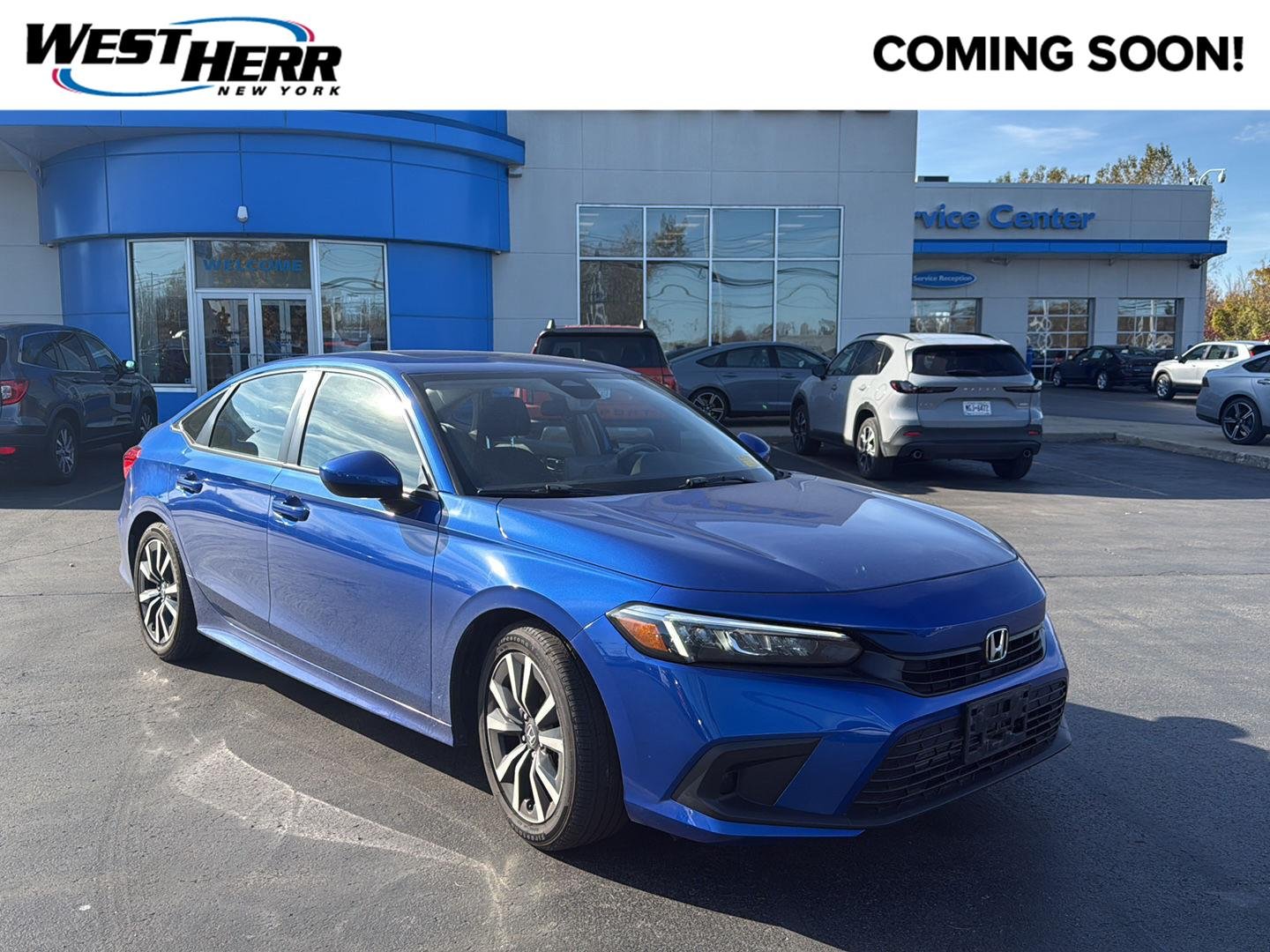 Used 2024 Aegean Blue Metallic Honda EX image 1
