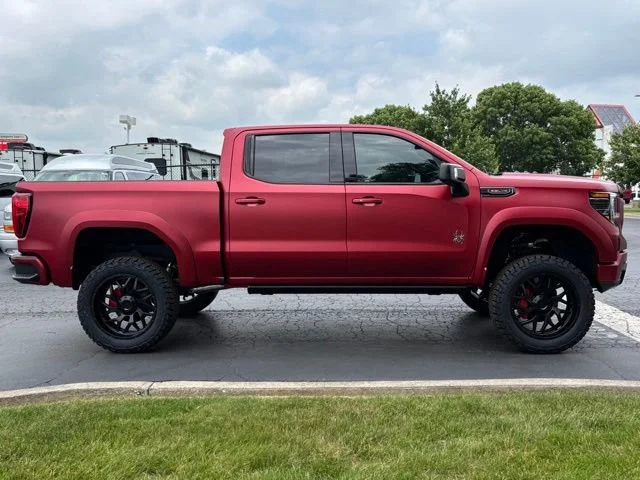 New 2026 VOLCANIC RED TINTCOAT GMC AT4 image 9