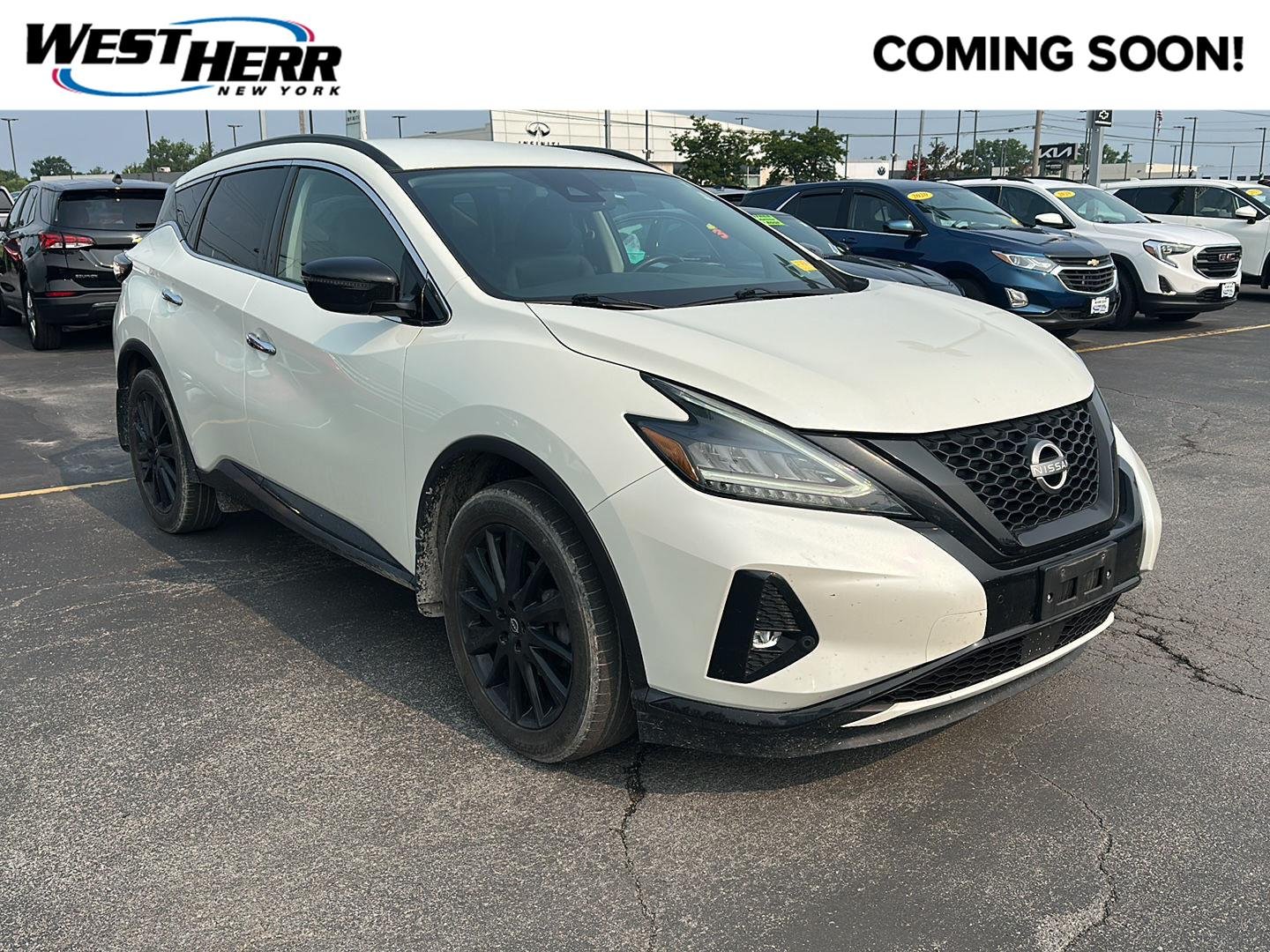 Used 2023 Pearl White Tricoat Nissan SV image 1