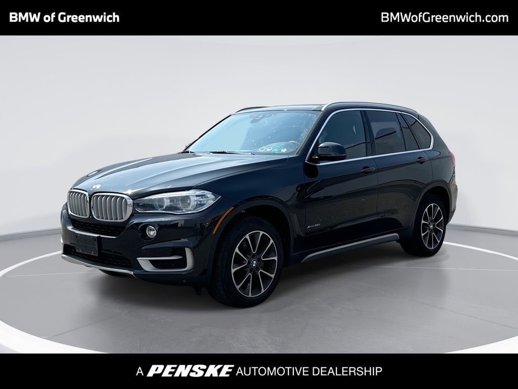 Used 2017 Black Sapphire Metallic BMW xDrive35i image 1