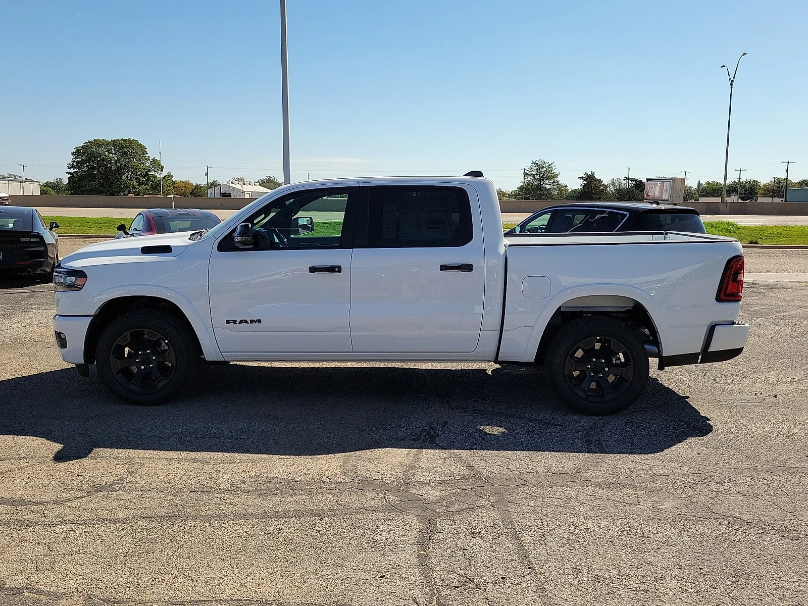 New 2027 Bright White Ram LONE STAR CREW CAB 4X4 5