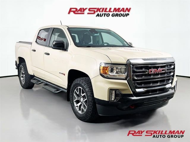 Used 2021 DESERT SAND METALLIC GMC 4WD AT4 w/Leather image 1
