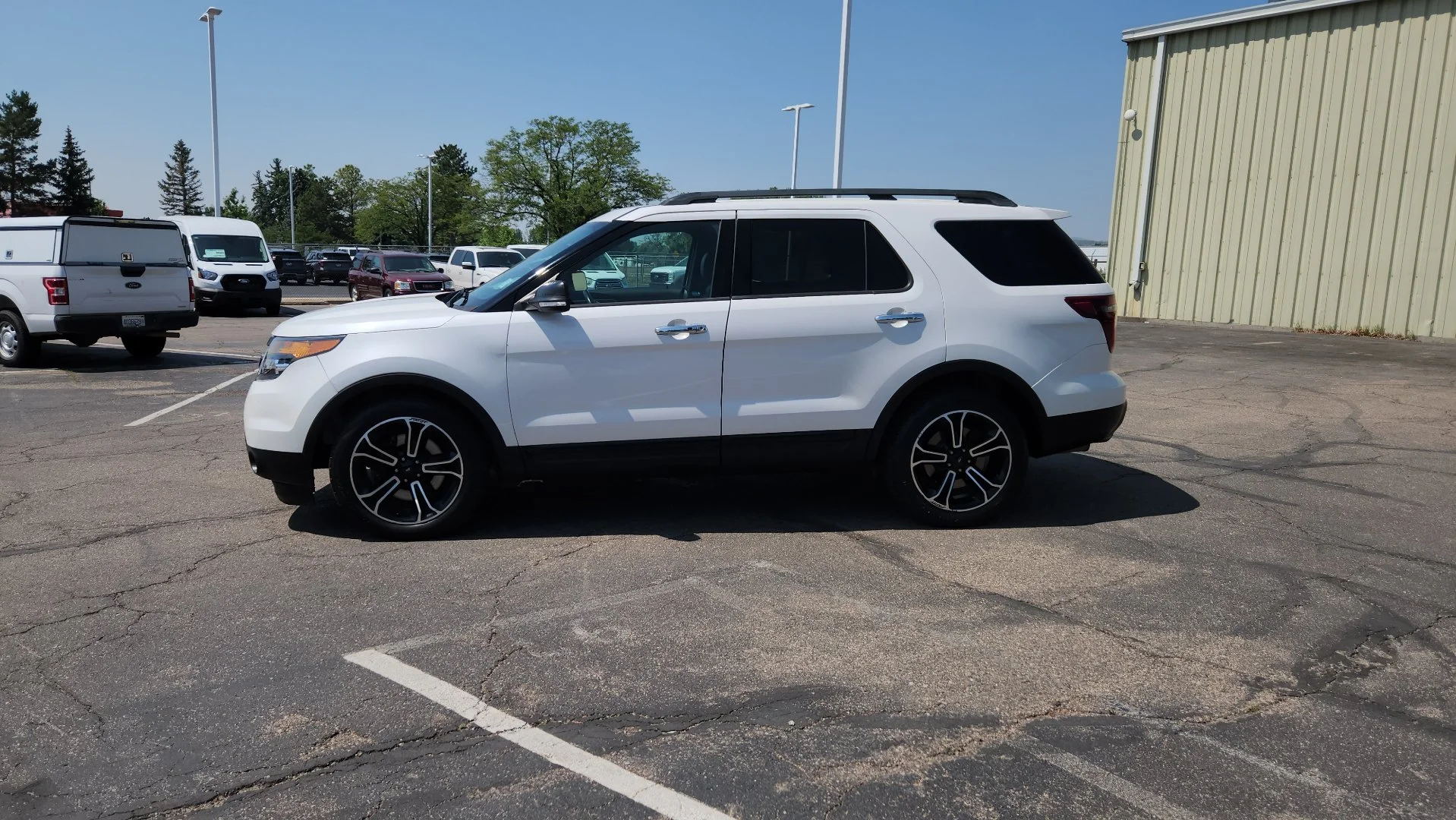 Used 2014 White Platinum Clearcoat Metallic Ford Sport image 4