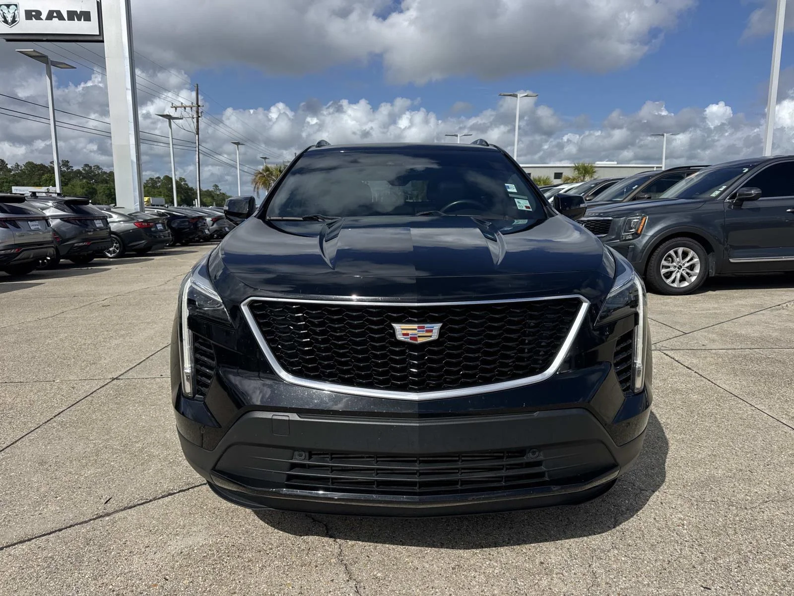 Used 2023 Stellar Black Metallic Cadillac FWD 4dr Sport image 2