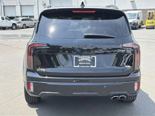Used 2025 Black Kia EX X-Line image 12