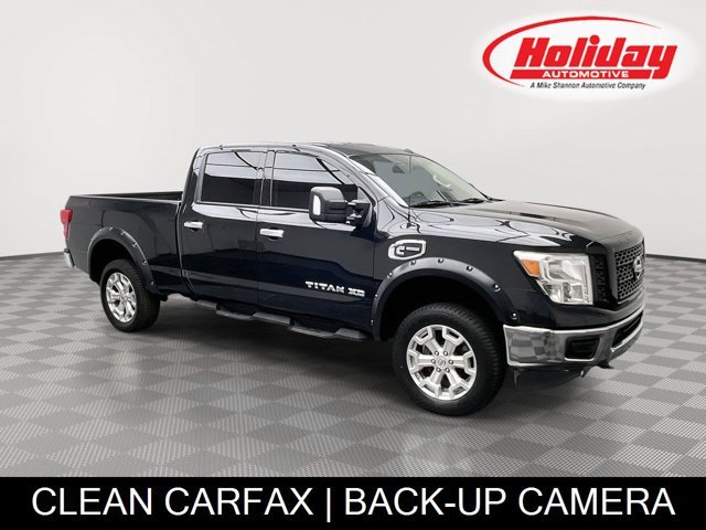 Used 2019 Magnetic Black Metallic Nissan SV image 1