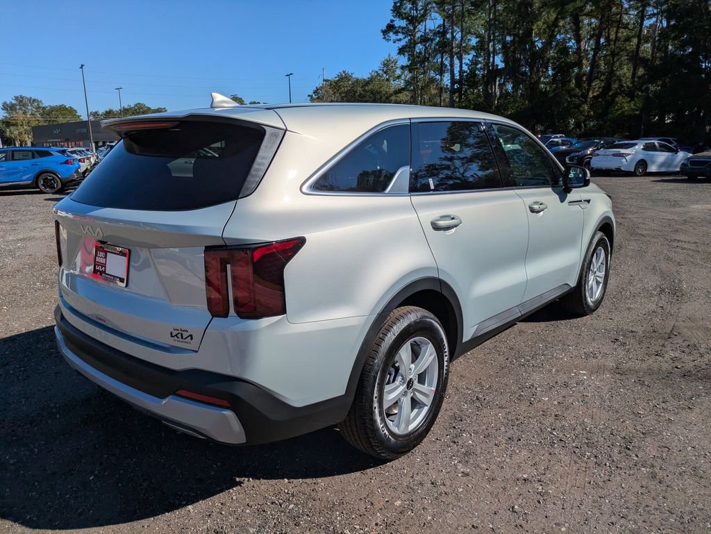 New 2026 Ivory Silver Kia LX image 3