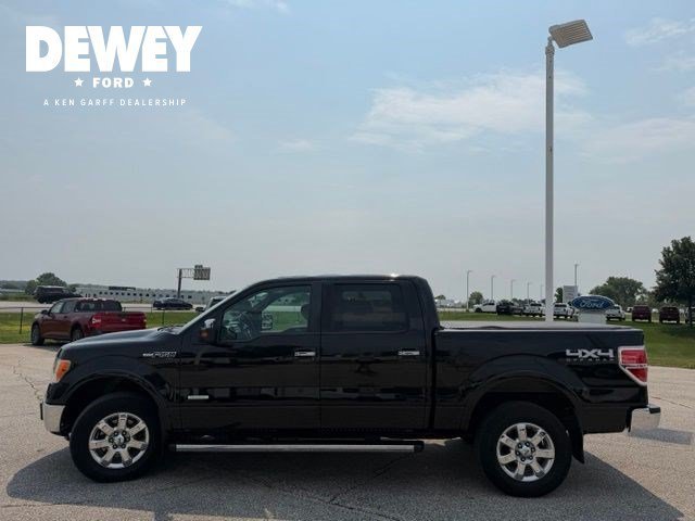 Used 2013 Tuxedo Black Metallic Ford Lariat image 4