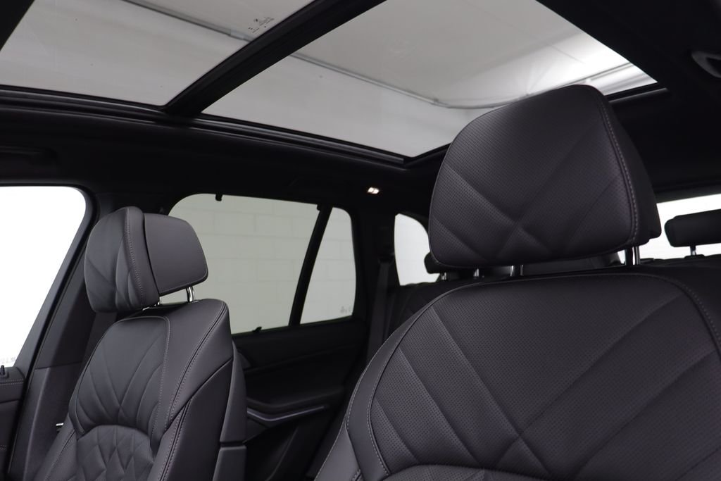New 2026 Black Sapphire Metallic BMW xDrive50e image 15